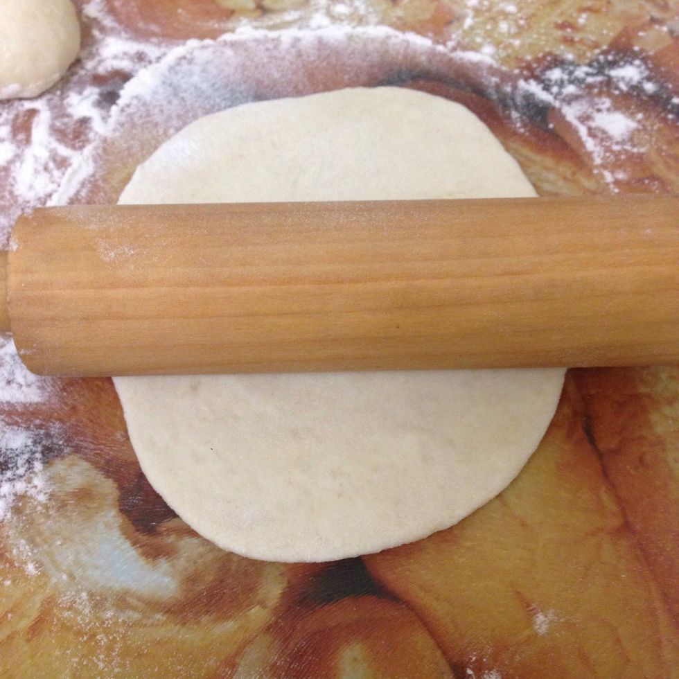 Start rolling the dough not too thick nor too thin ..
