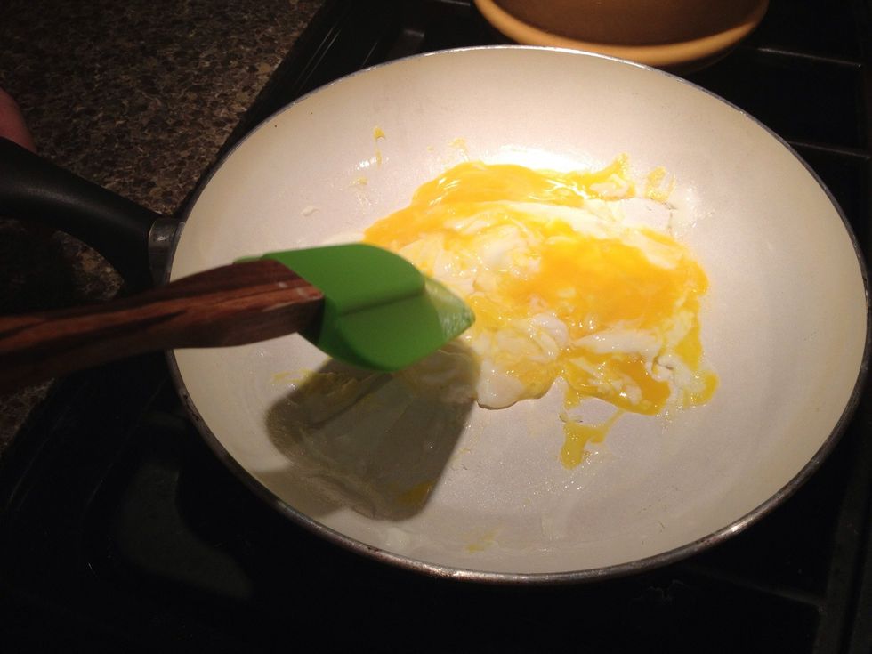 Start scrambling the eggs with the spatula