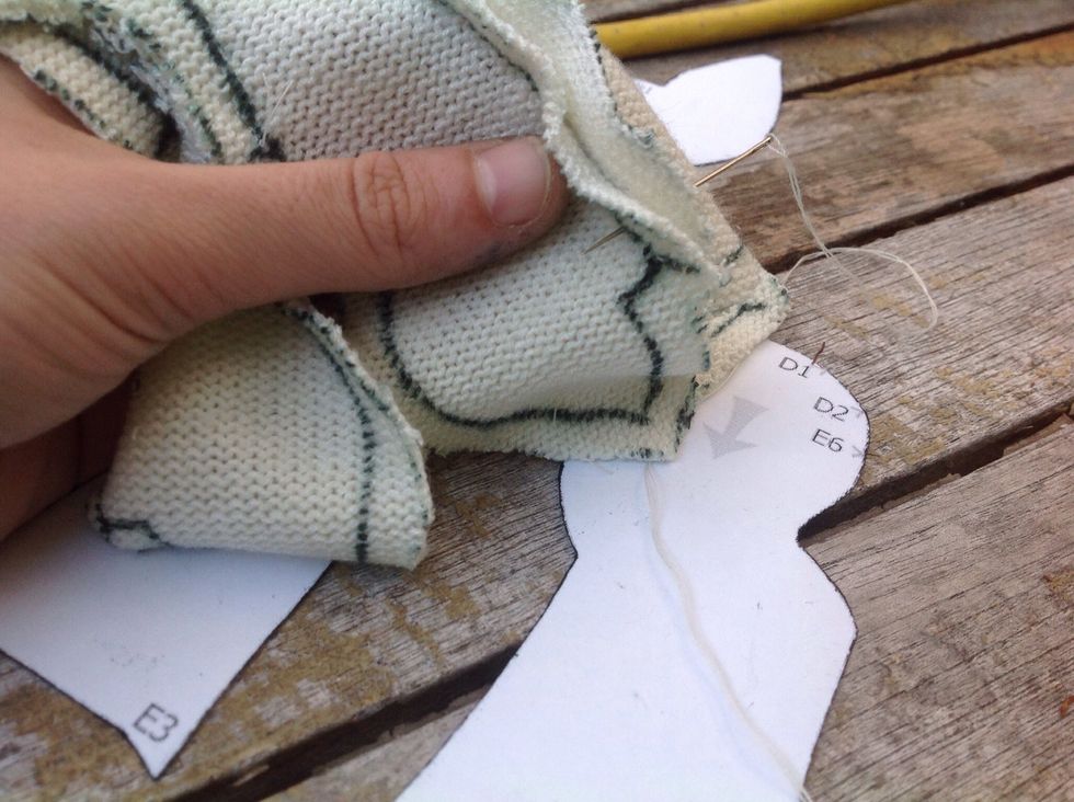 Start sewing the pieces together along the inside line according to their markings.