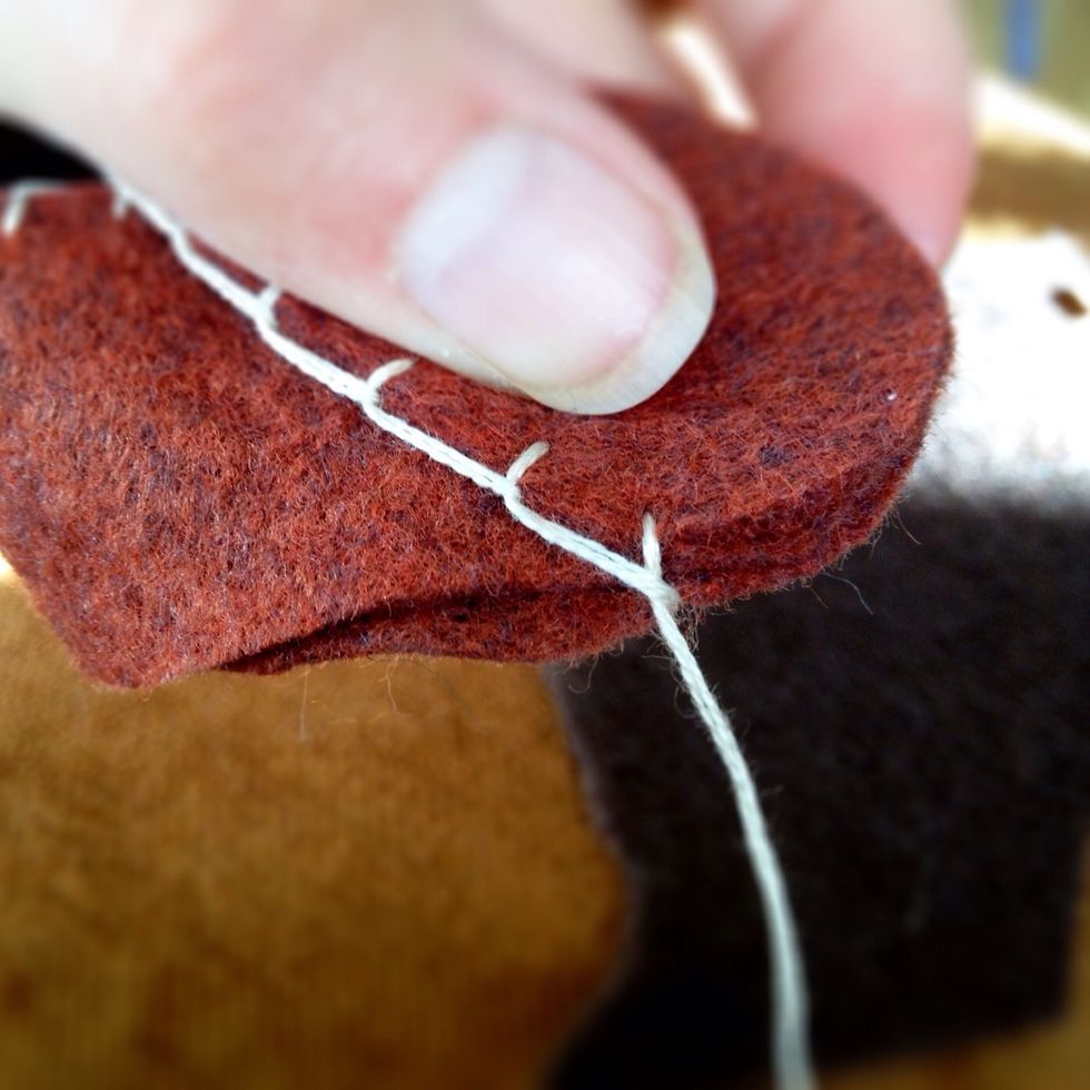 Start sewing through all the layers.
