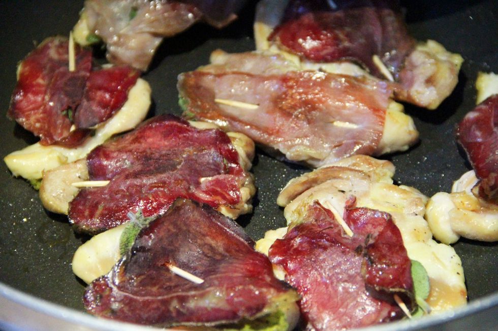 Start sizzeling in pan with some olive oil and as soon as slitely brown add your half cup of white wine. Add a pinch of salt and pepper