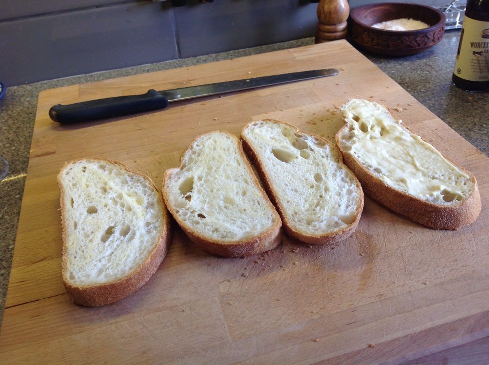 Start spreading on the cheese sauce