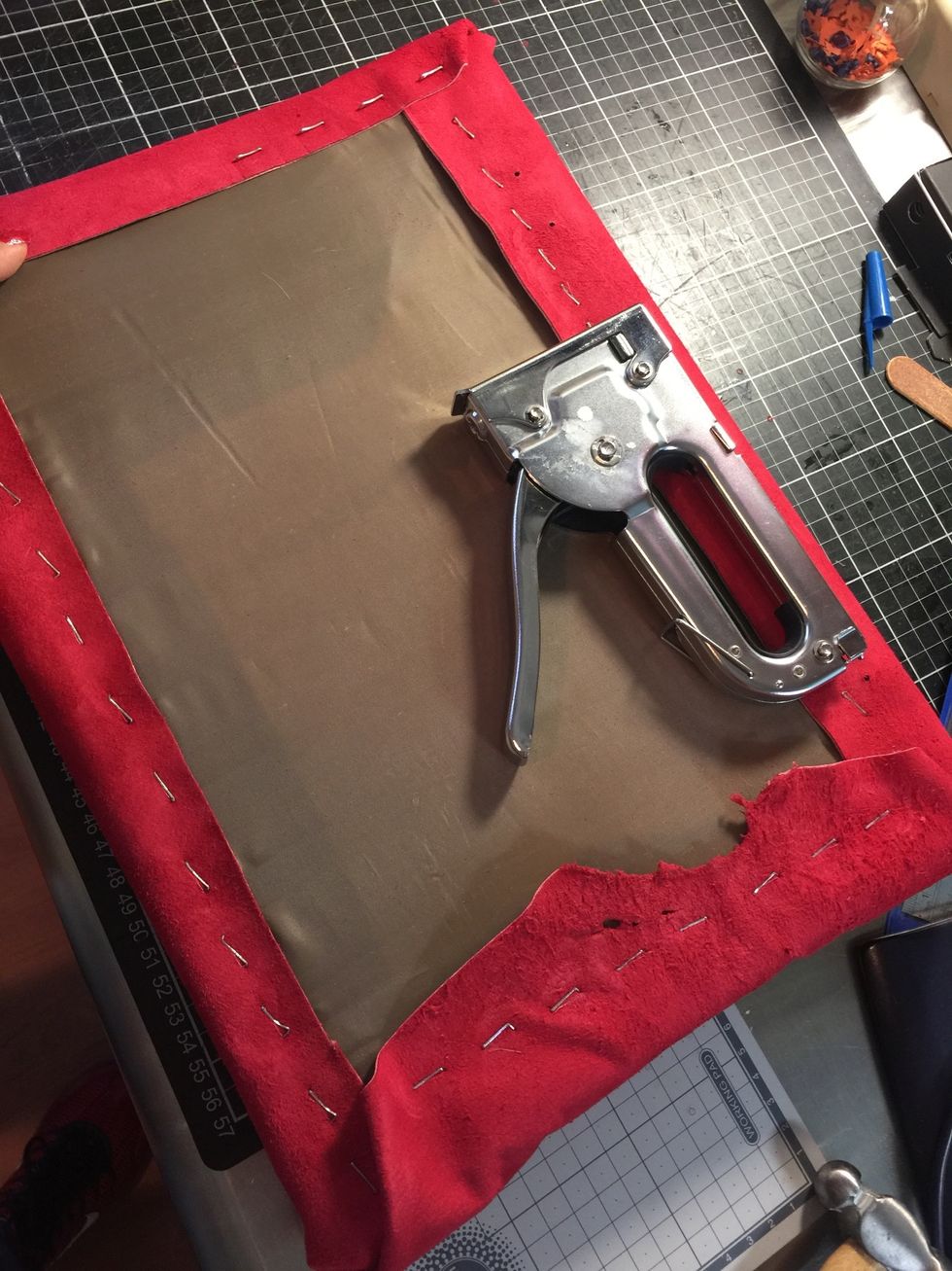 Start stapling along sides and fold on corners