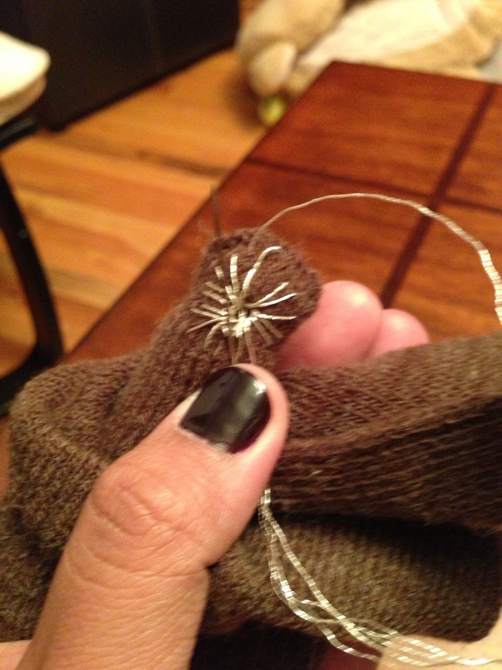 Start stitching any pattern you prefer. Make sure you stitch on the right side of the glove.