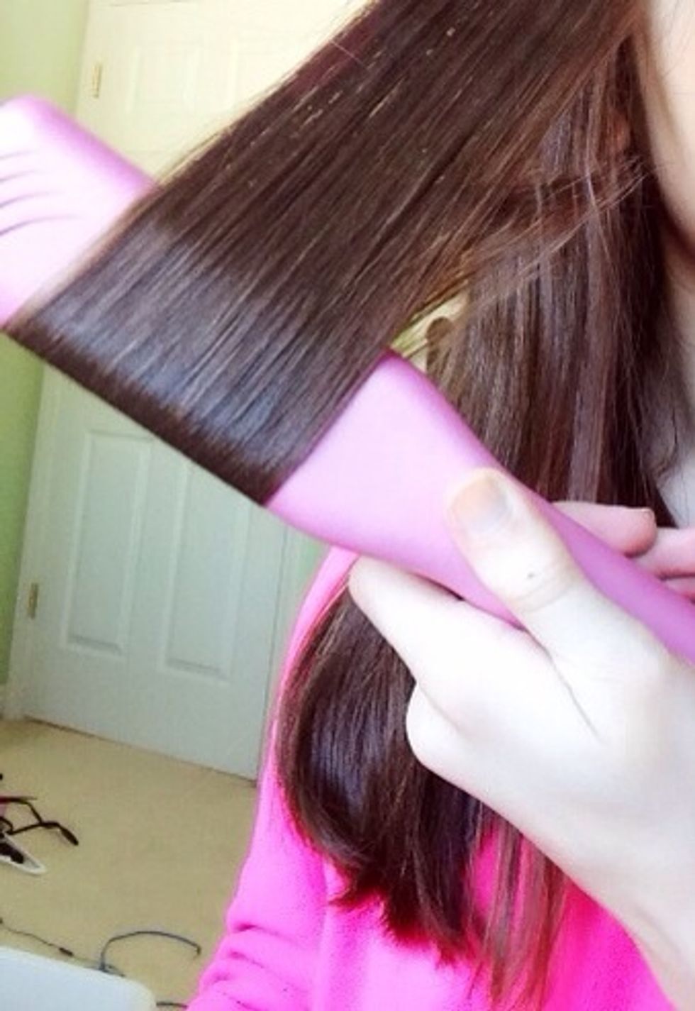 Start straightening your hair normally but the curve it under at the end