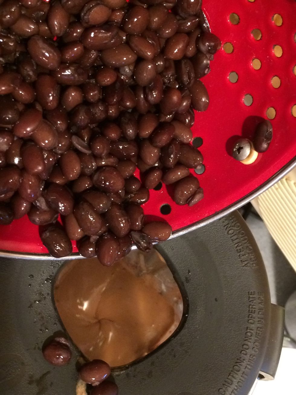 Start the blender and pour in the black beans until they are blended very well. After they are all in the blender, increase the speed to high until the dough is completely smooth.