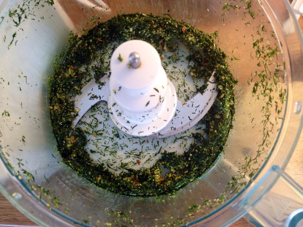 Start the machine and chop it up. Scrape down what's clinging to the sides.