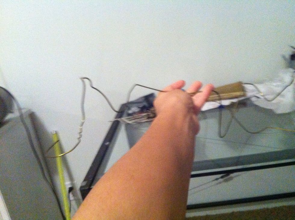 Start to bend and twist the hanger to give its original appearance a completely different shape.