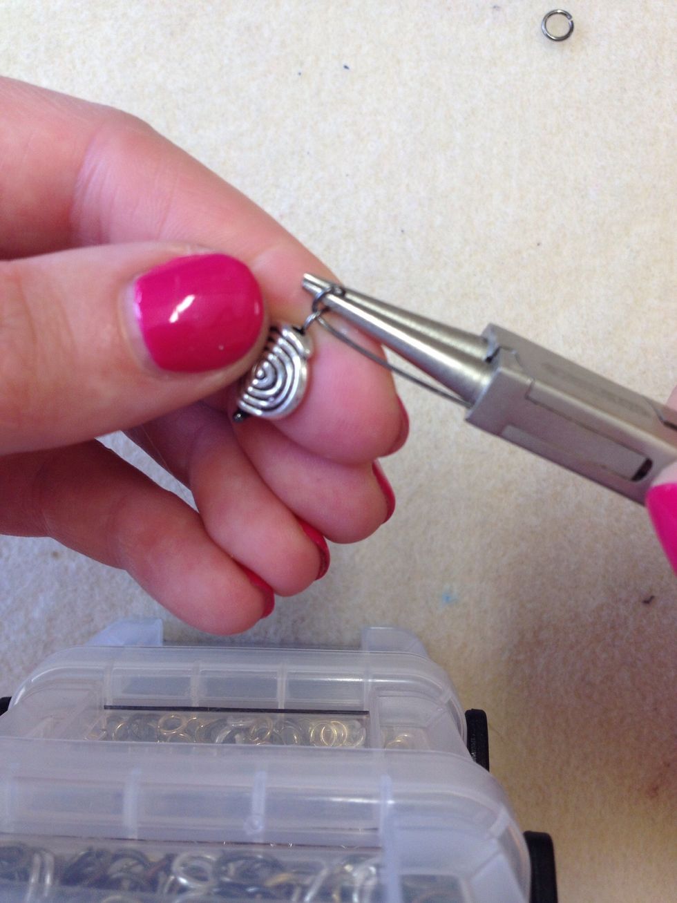 Start to bend the wire like this