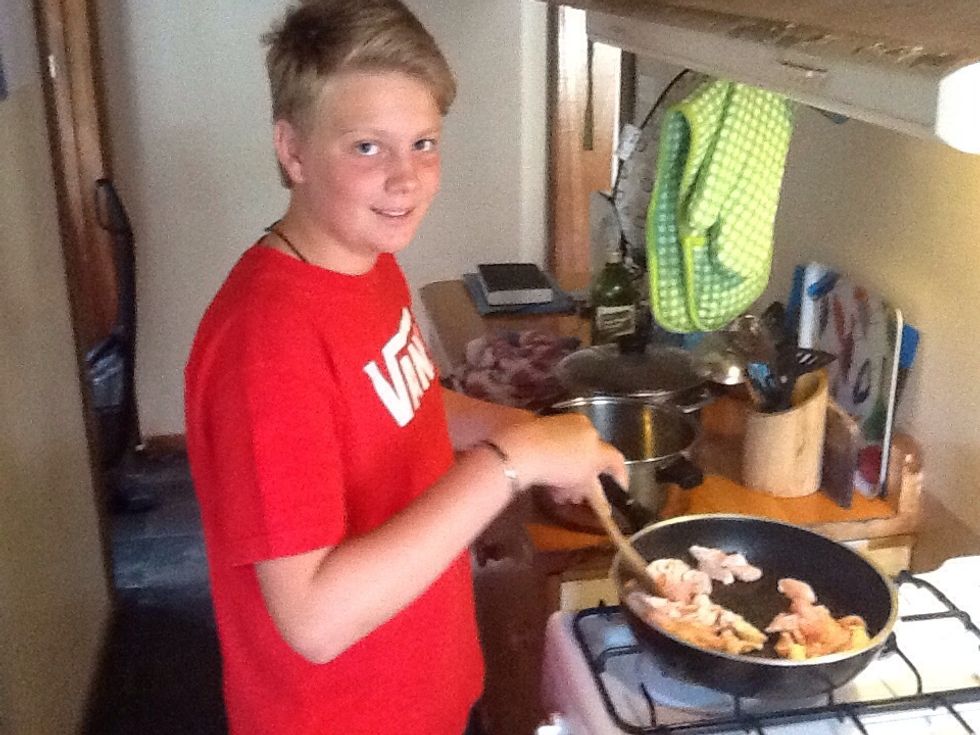 Start to brown the chicken.