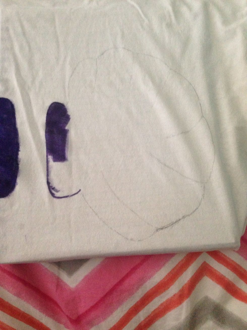 Start to color in your seashell. I place a thick notebook under where I am coloring so the marker won't bleed through and so I have a hard surface to draw on.