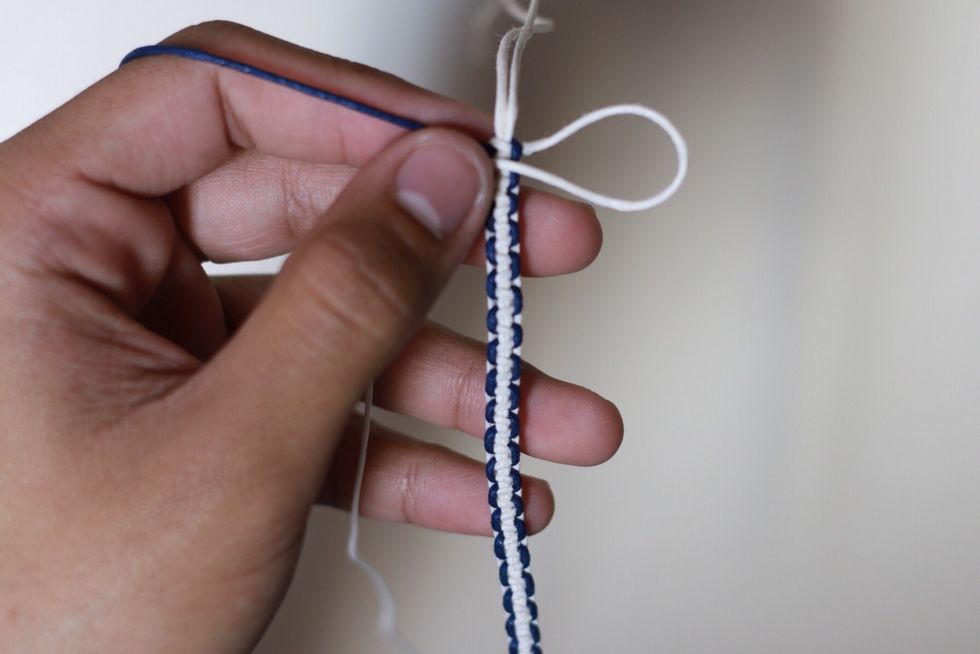 Start to do the cobra stitch on the original cobra stitch you just finished, like so in the picture above.