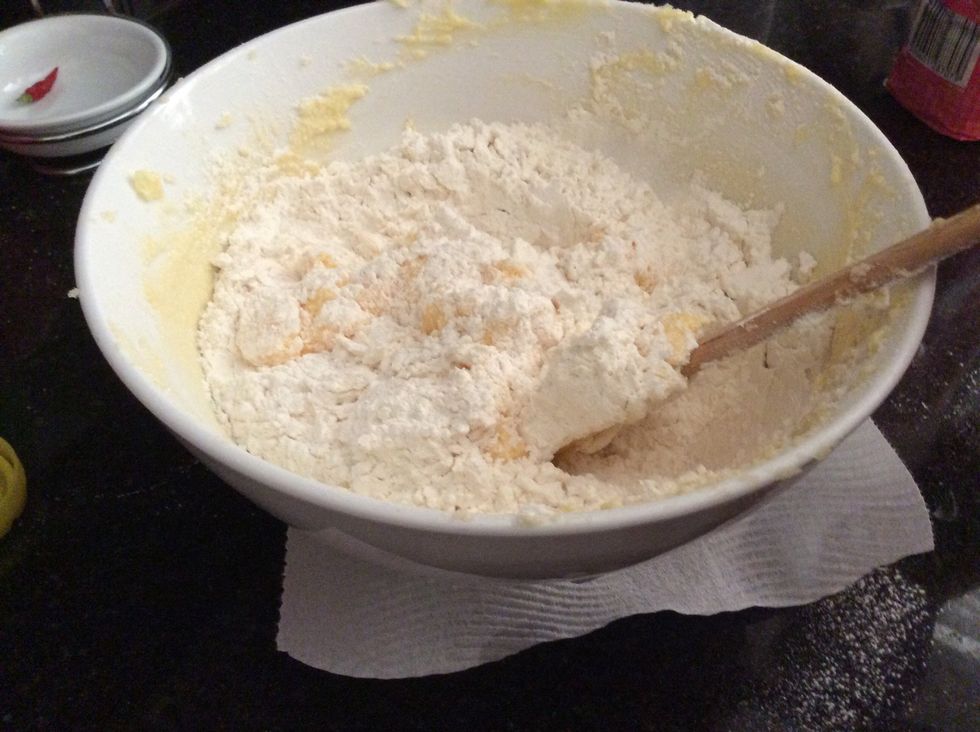 Start to fold in the flour