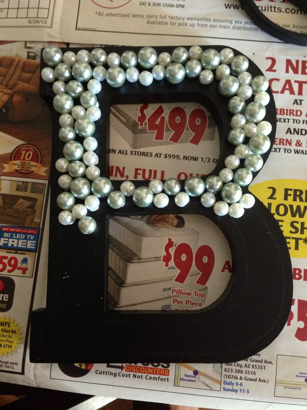 Start to glue on your beads alternating the different size beads.