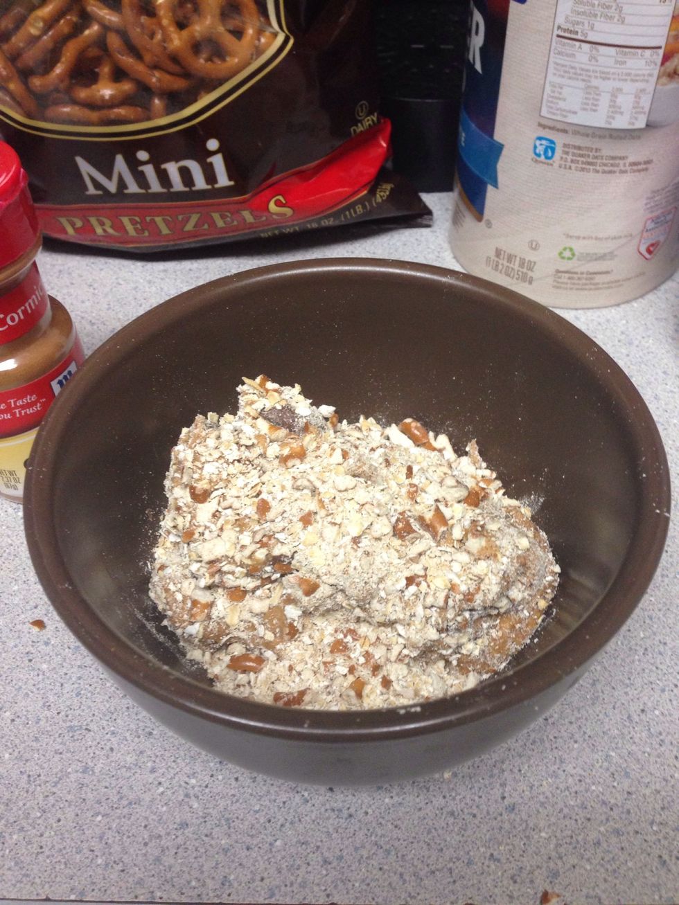 start to mix oats/pretzels from bottom of bowl on top of peanut butter etc
