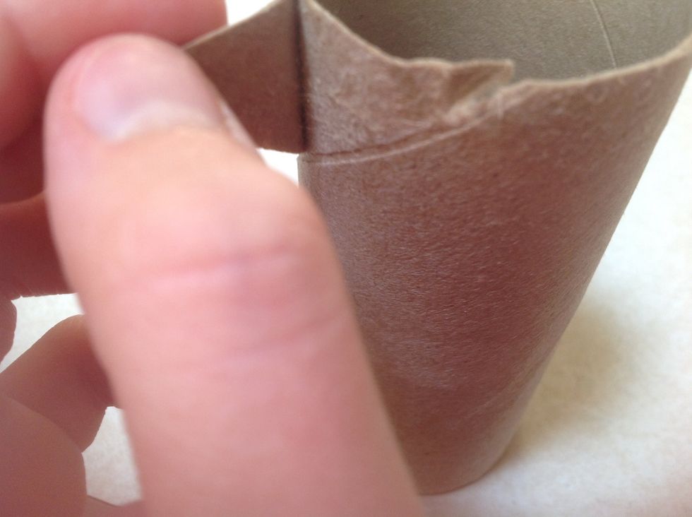 Start to peel off that little piece of a triangle on the top.