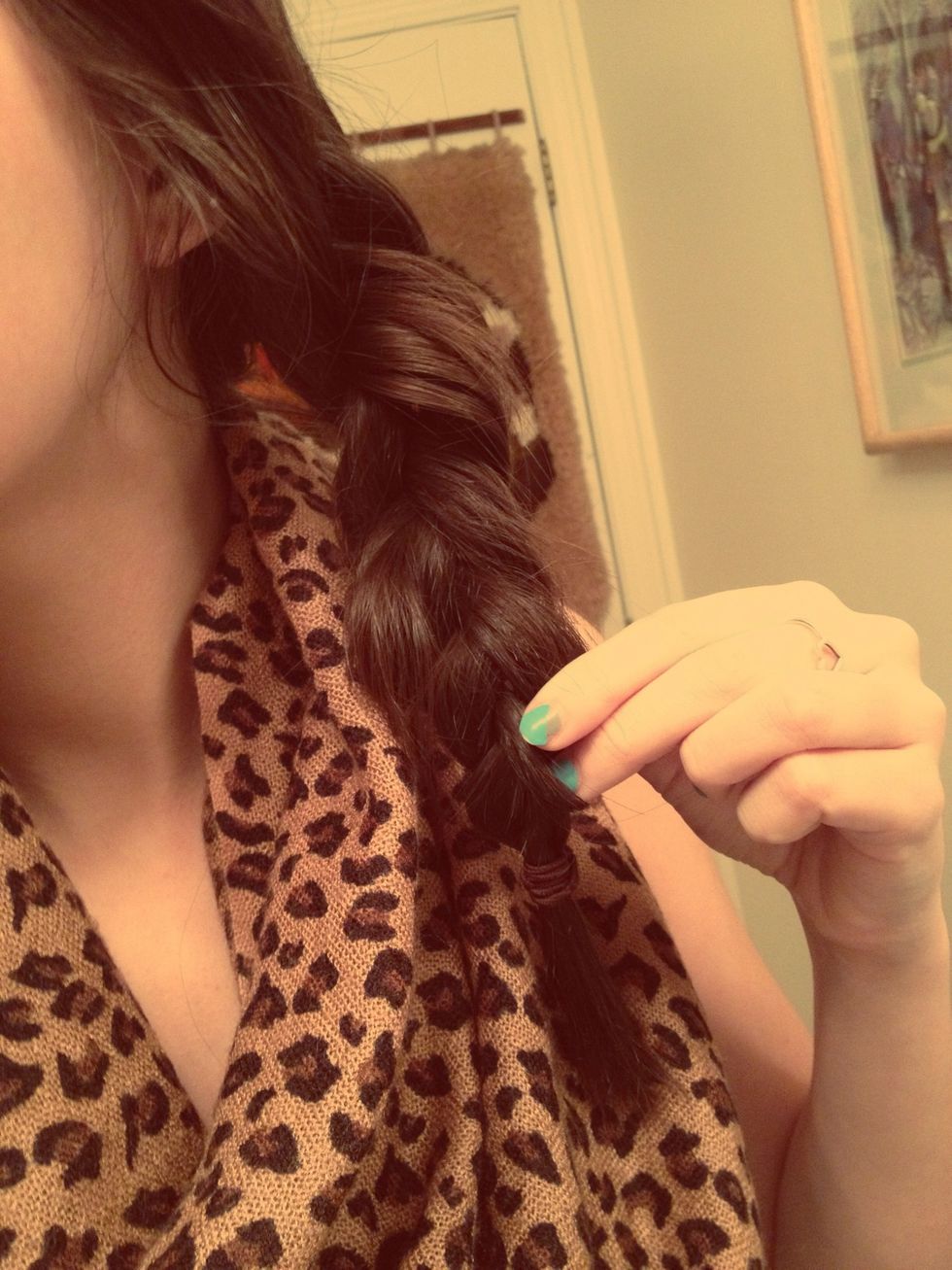 Start to pull on the braid (not to hard) if you want looser and more natural looking curls.