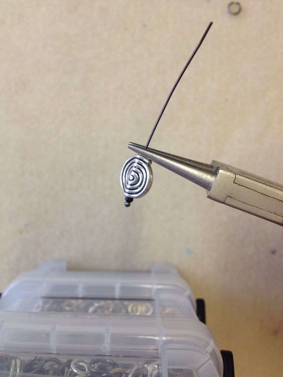 Start to wire wrap the beads