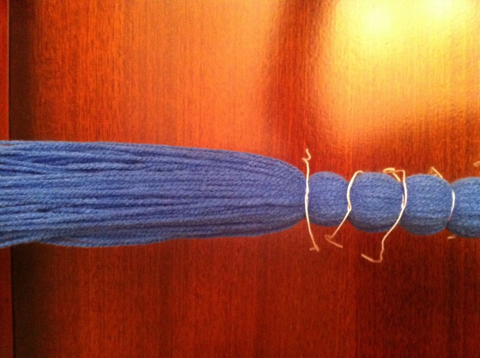 Start tying knots at an inch separation