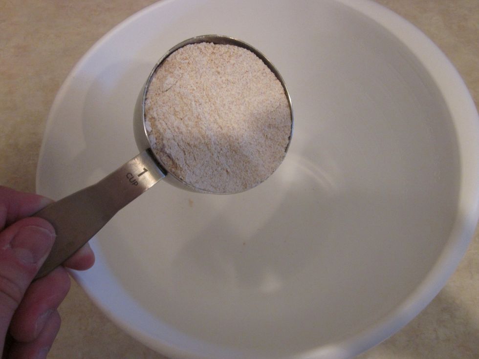 Start with 1 Cup of Wheat Flour in a medium size mixing bowl. Actually use any bowl you want, I'm an equal opportunity bowl user
