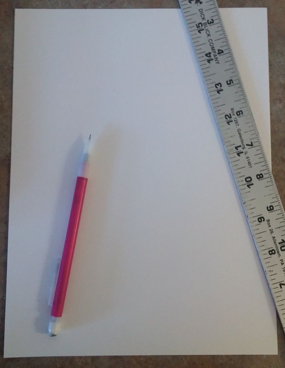 Start with a 10 1/2 x 8 inch piece of thick drawing paper, a pencil, and a ruler