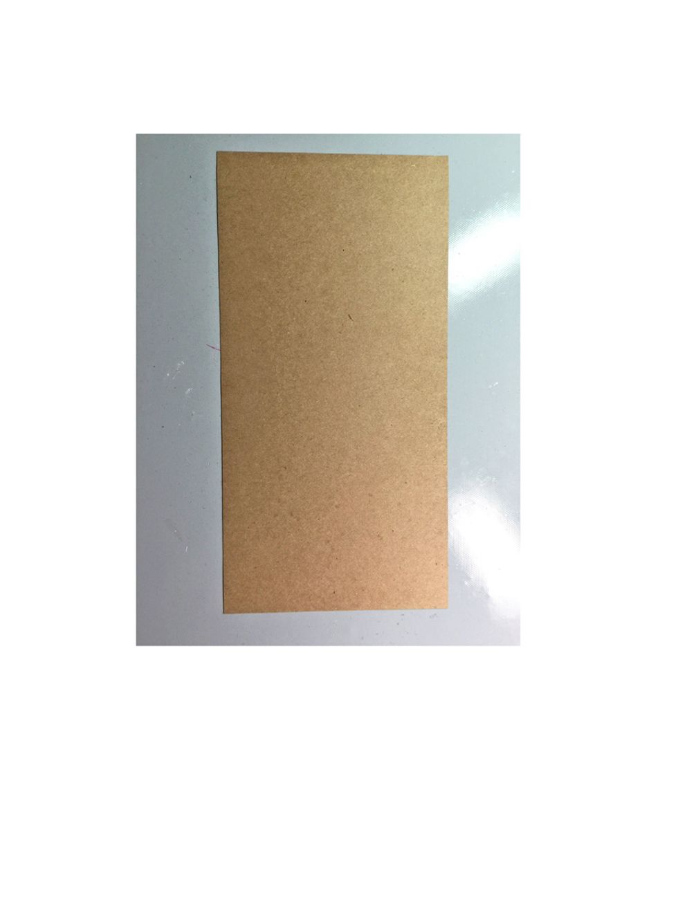 Start with a 10" x 5" sheet of plain card stock. I'm suing Kraft card stock for my base as I love that it goes with everything.