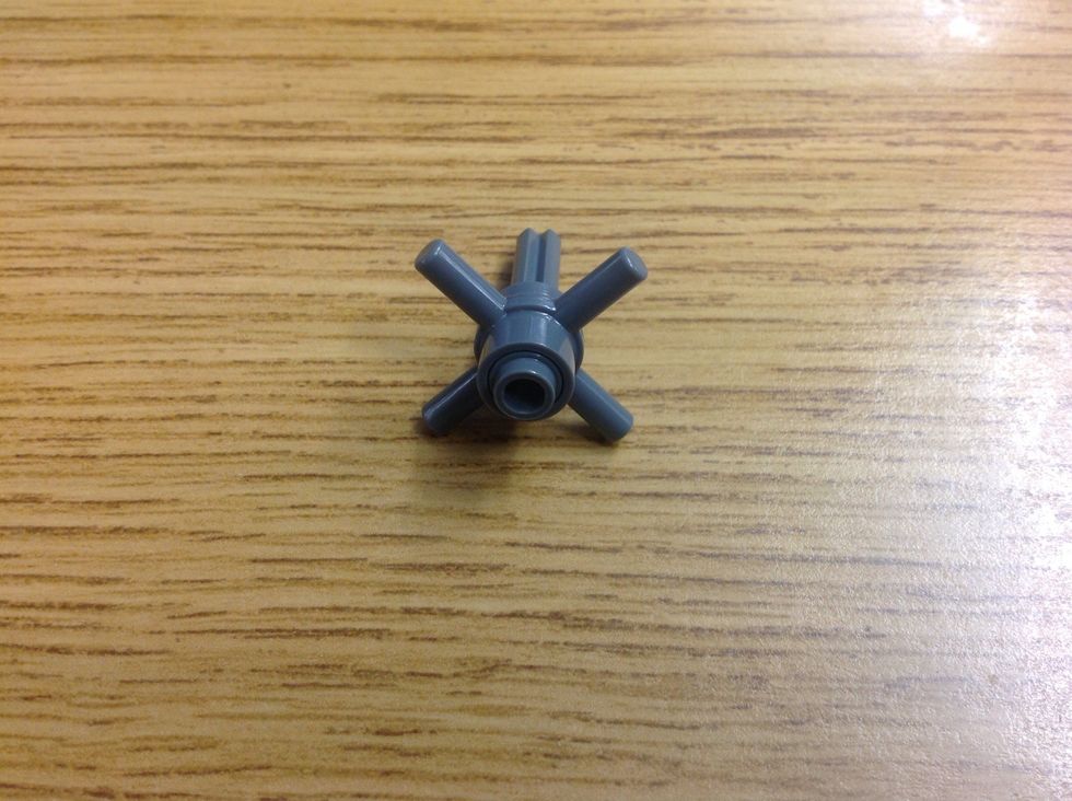 Start with a 4 prong handle and a grey + rod with stud on the end.