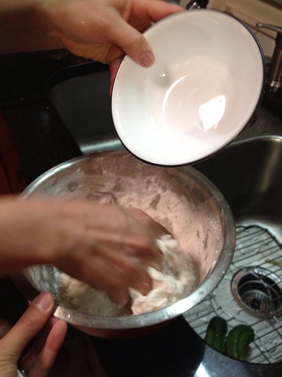 Start with a bag of glutinous rice flour- slowly add in 1 1/2 cups of warm water (while Kneading) and 1 Tbsp of olive oil and 3 Tbsp of tapioca starch. Now start kneading that dough throughly!! =p