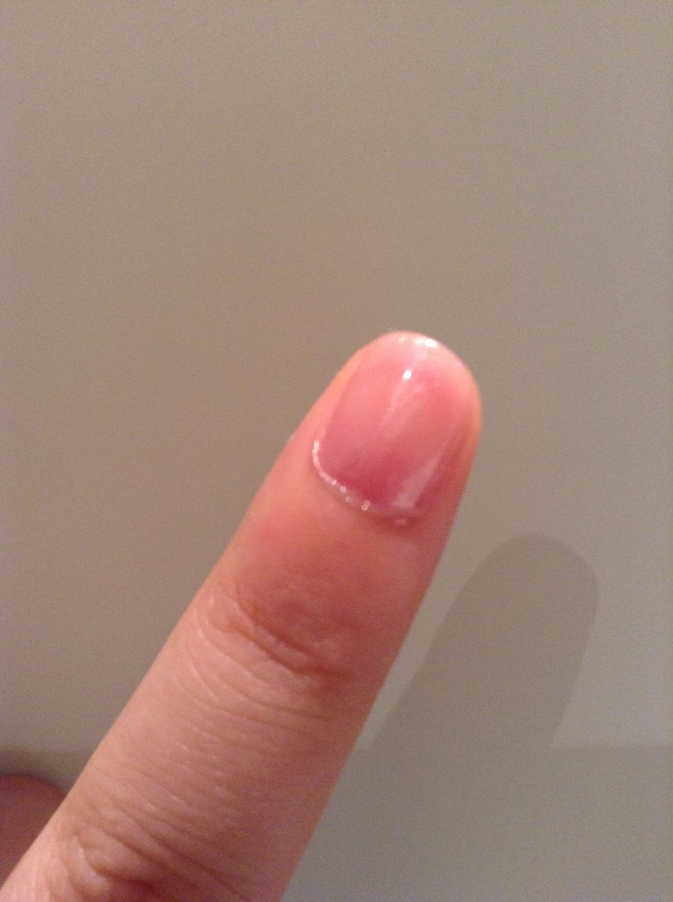 Start with a base coat and apply some subtle glitter polish if desired