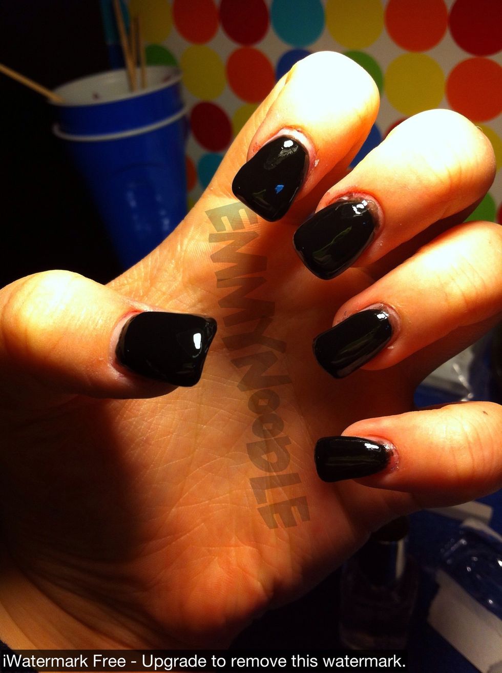 Start with a base coat and two coats of a black polish.