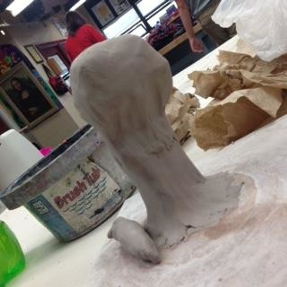 Start with a base in the general shape of a wrist and palm