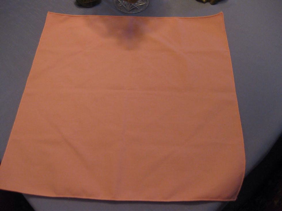 Start with a dinner size napkin.