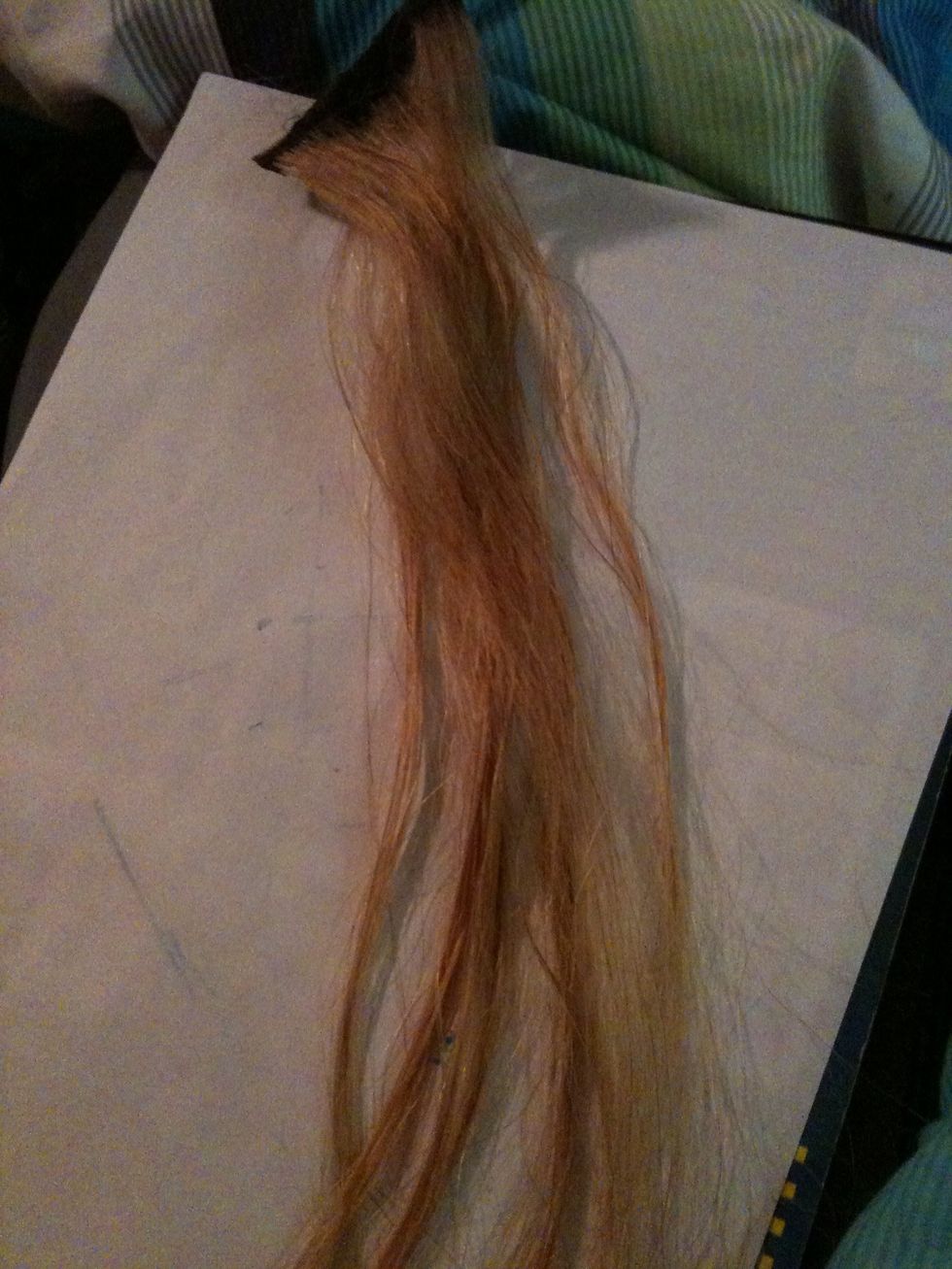 Start with a hair extension or light colored hair