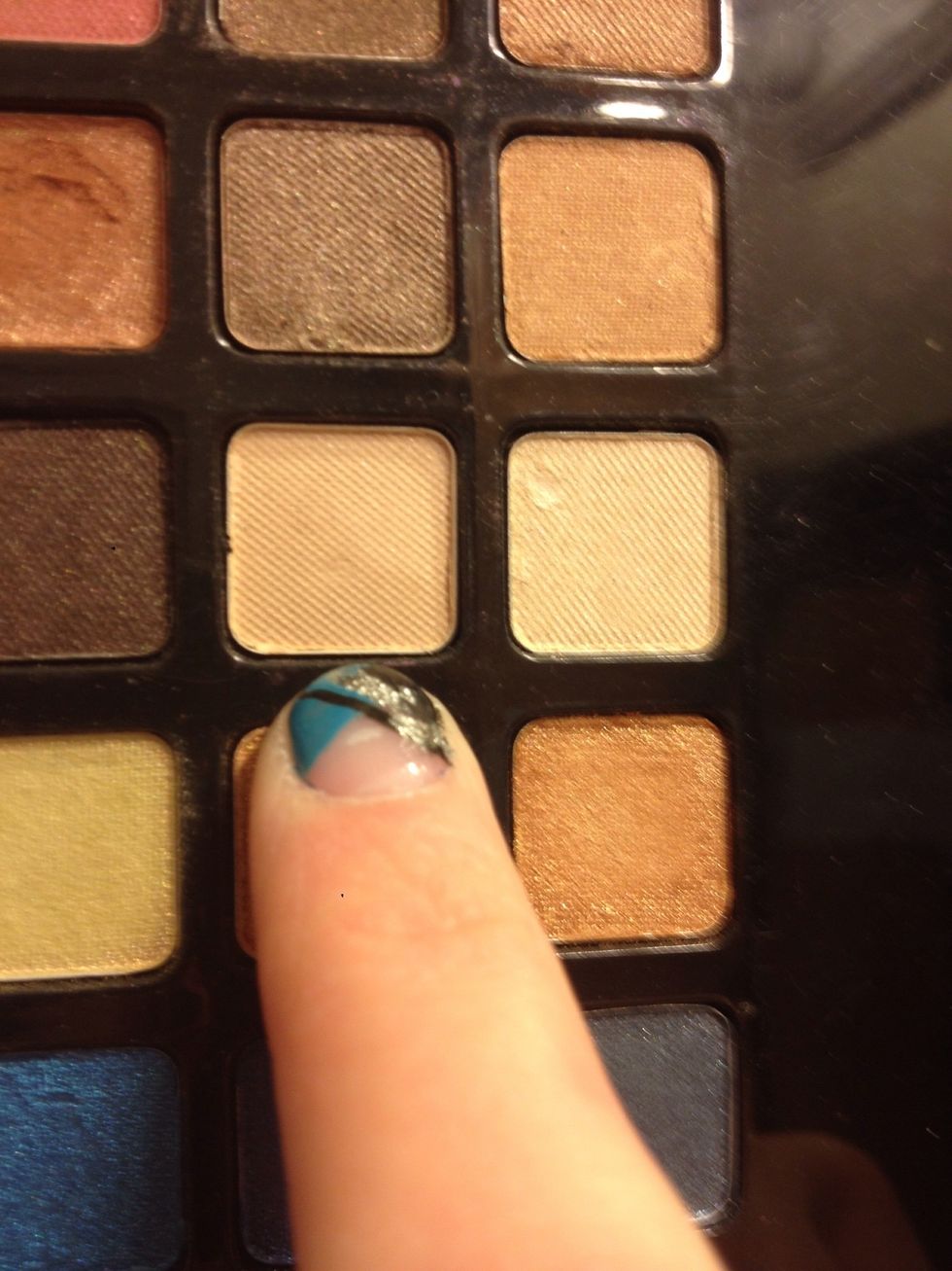Start with a nude powder shadow