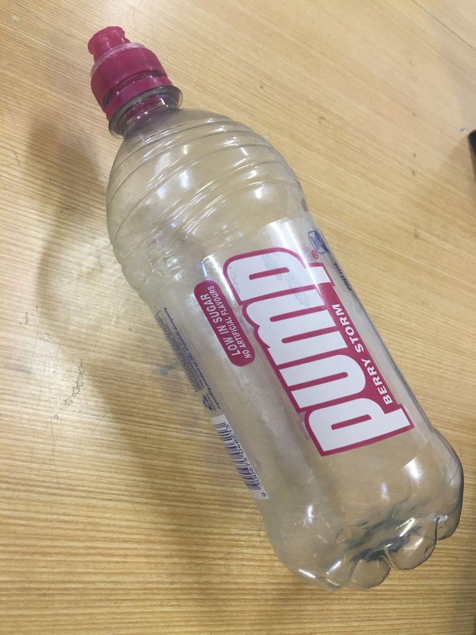 Start with a plastic bottle and remove the label.