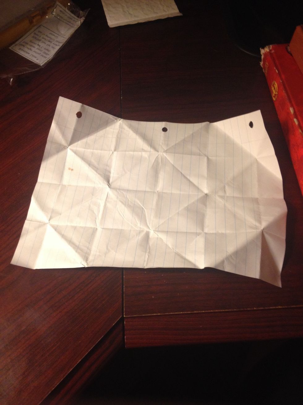 Start with a sheet of lined paper with the holes on the top