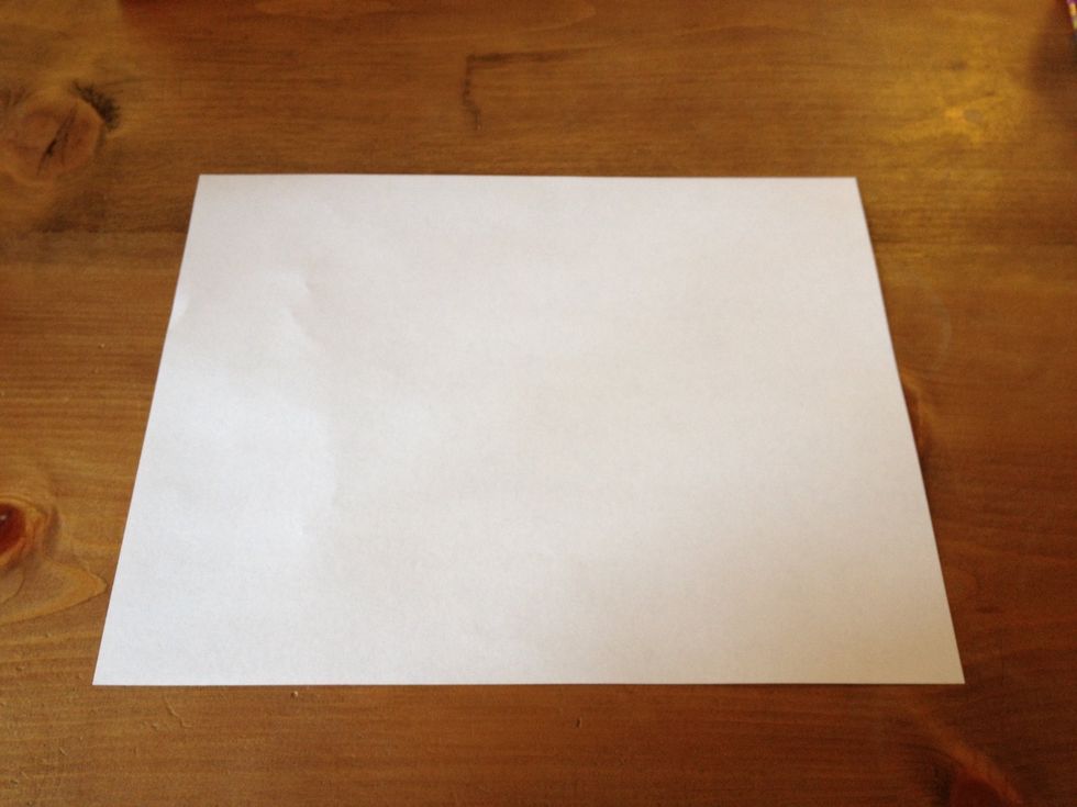Start with a sheet of paper.