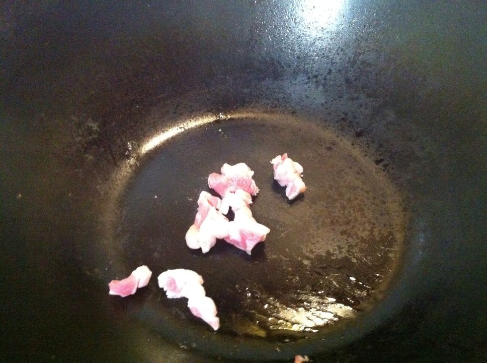 Start with a smoking hot wok. Add lard. Fry till crisp and keep aside. When using vegetable oil, disregard this step.