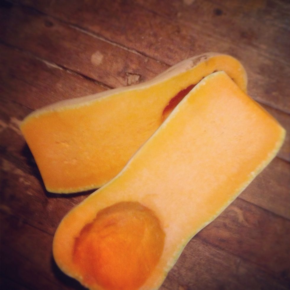 Start with a standard butternut squash. Wash the outside and cut in half, lengthwise. Discard the seeds and pulp and lay face-down on a lightly buttered baking dish.