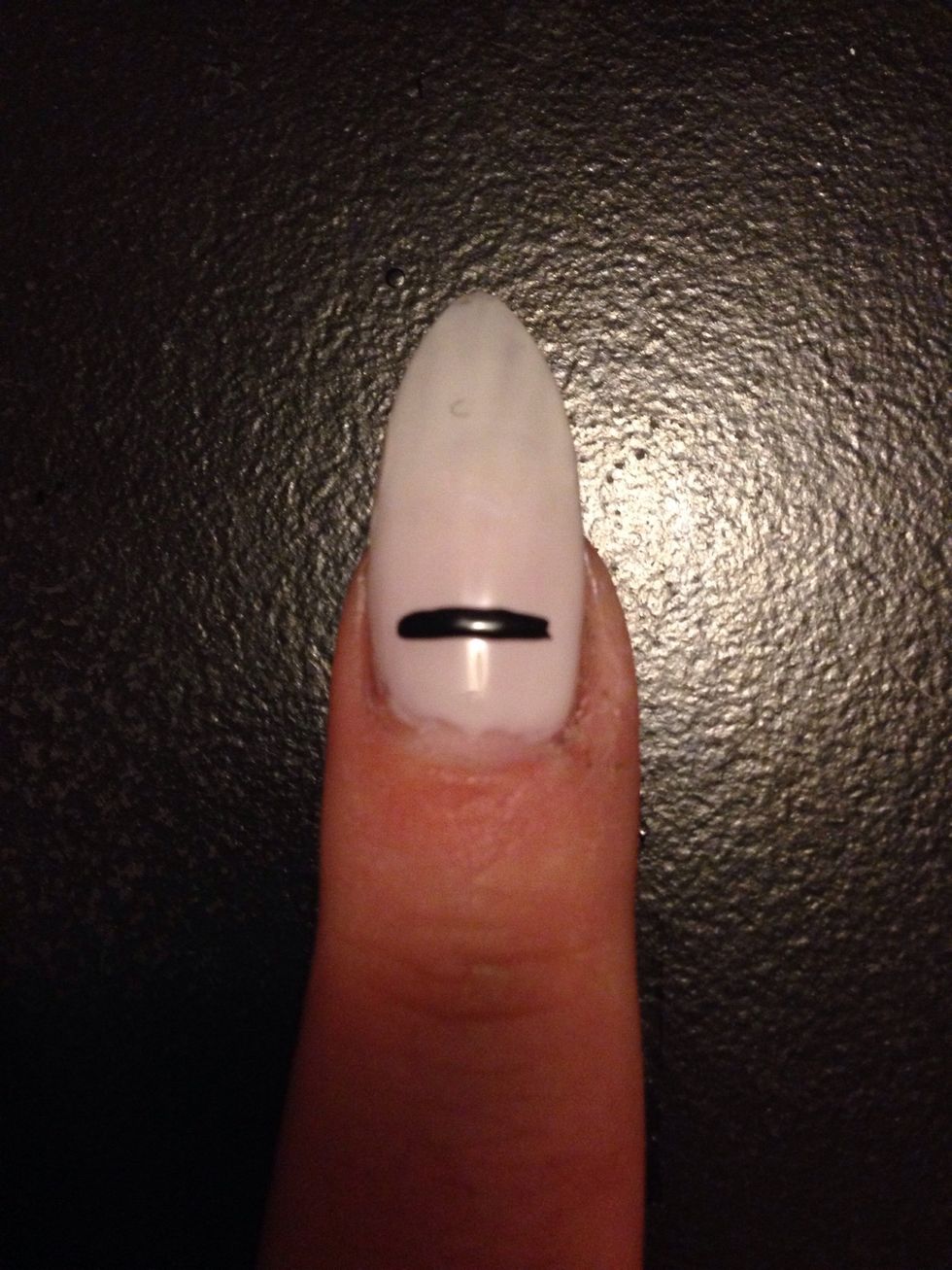 Start with a straight line across the nail.