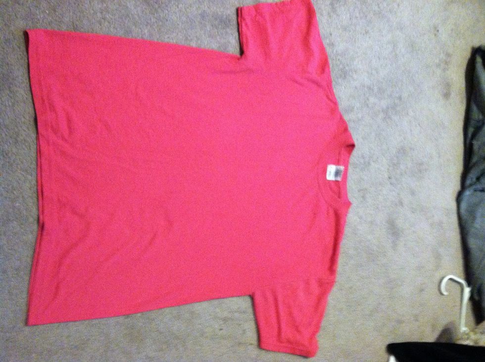 Start with a t shirt that is too big for you (the shirt will be smaller after you lace up the sides)