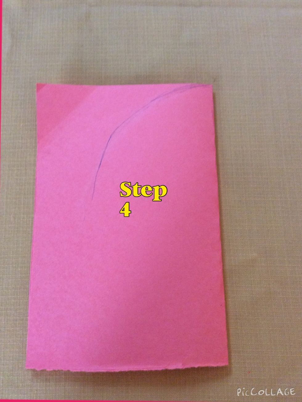 Start with an arch in the right corner of the construction paper and the arch getting bigger.