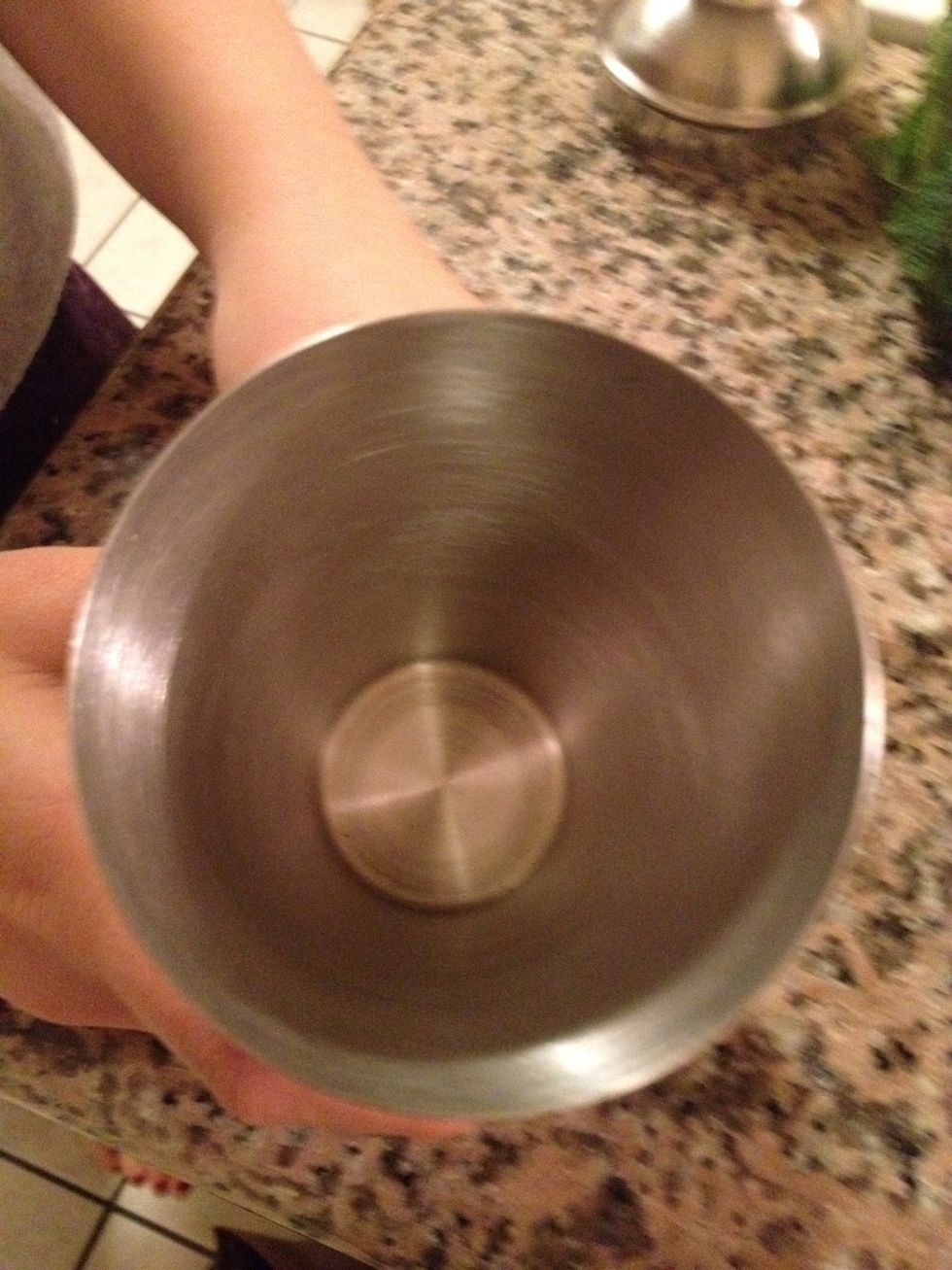 Start with an empty and completely dry cup. I use a shaker but a glass would probably work fine.