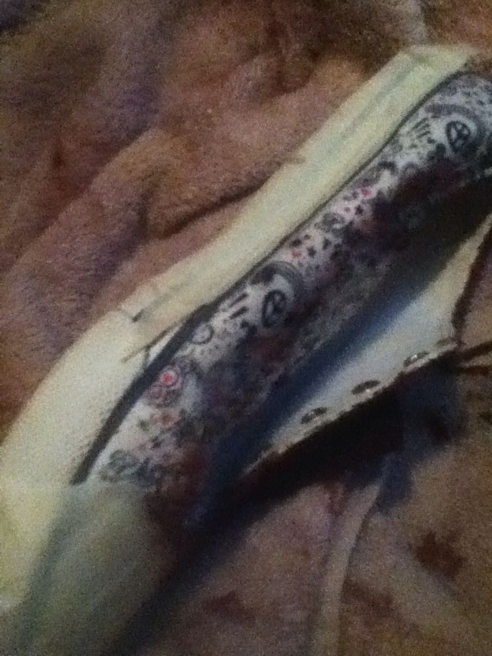 Start with an old pair of canvas shoes(: mine had designs but these can easily be covered up! Lay your shoes on a surface such as a towel and tape up any areas you want to keep paint free