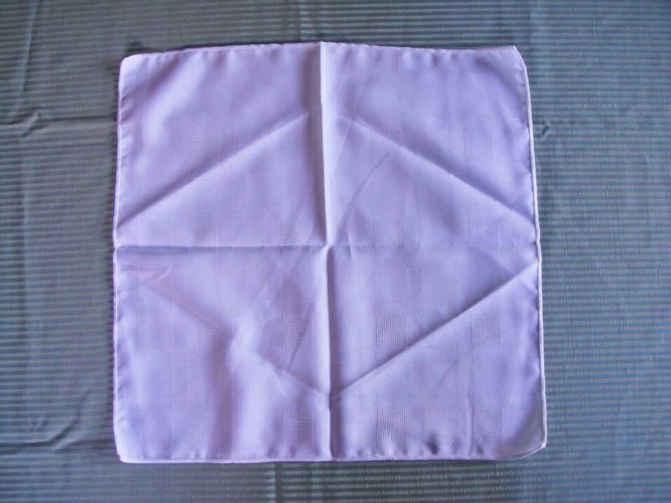 Start with an open cloth napkin
