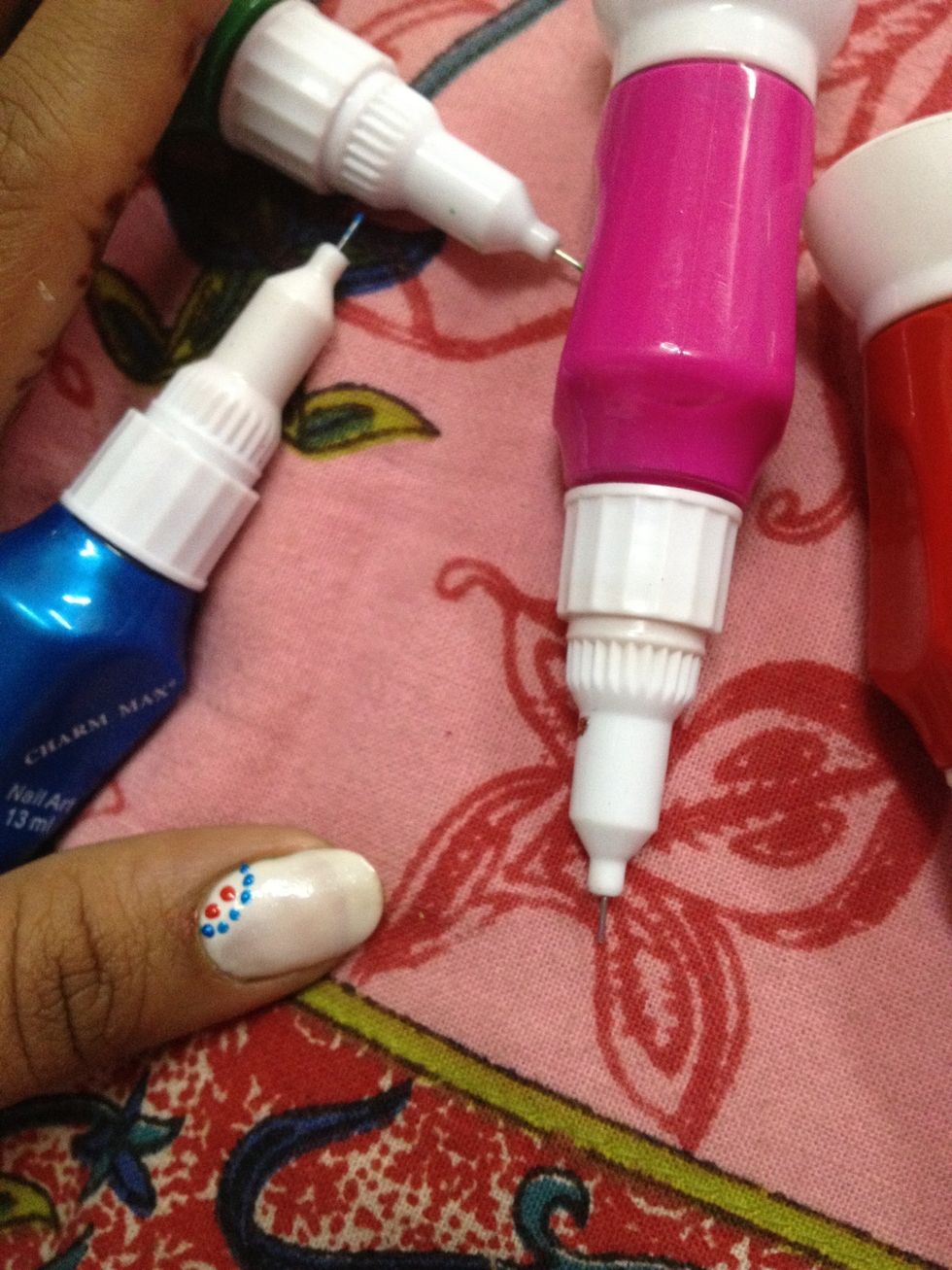 Start with bright colours dotting in a curved pattern