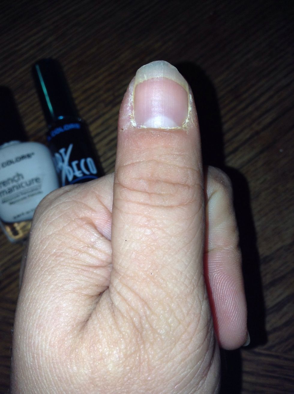 Start with clean, dry nail. Shape the nail however you want with your file. Then apply basecoat and let dry.