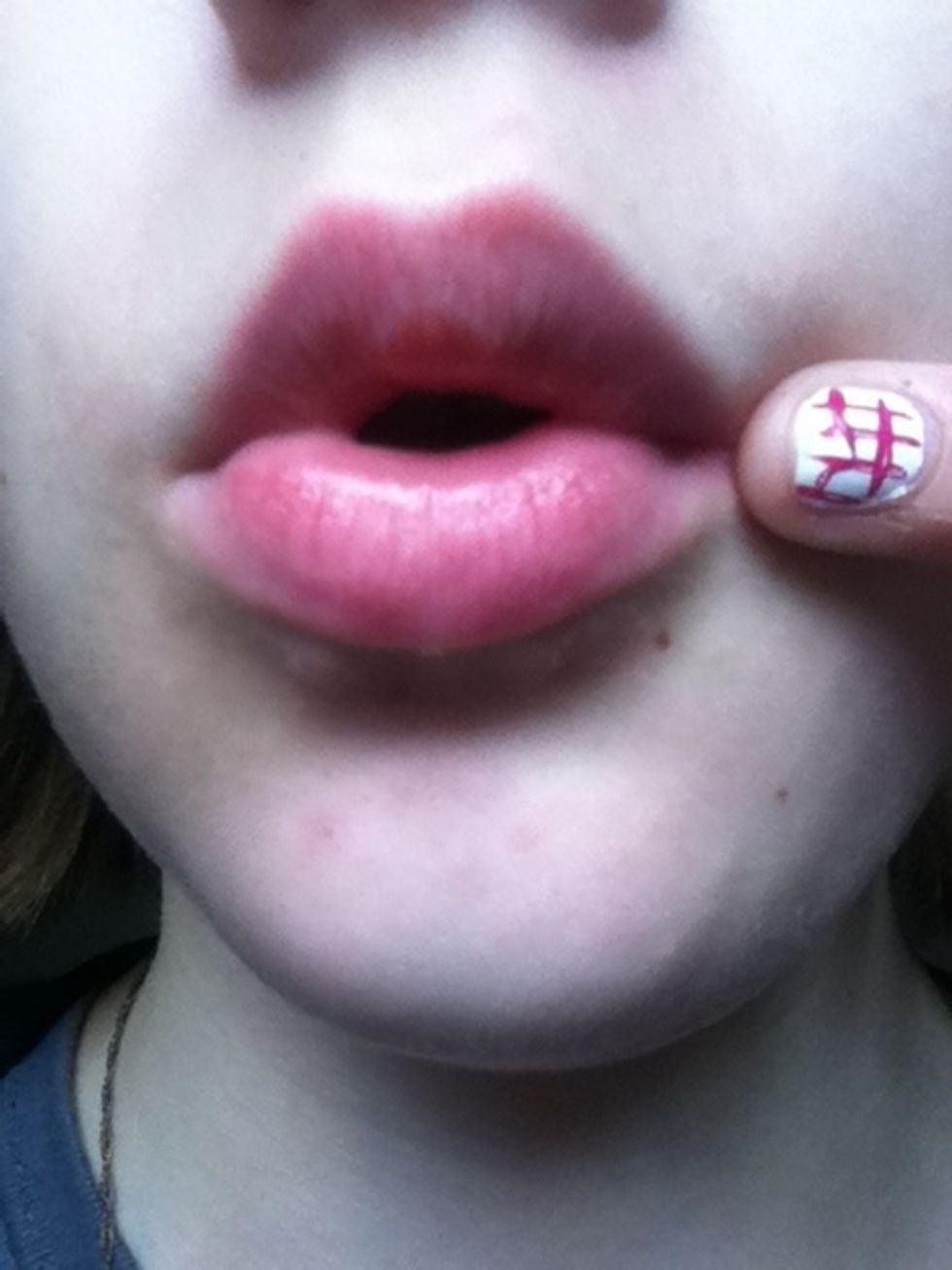 Start with clean, moisturised lips. It helps to exfoliate them before to reduce the amount of dead skin cells and help blood circulation.