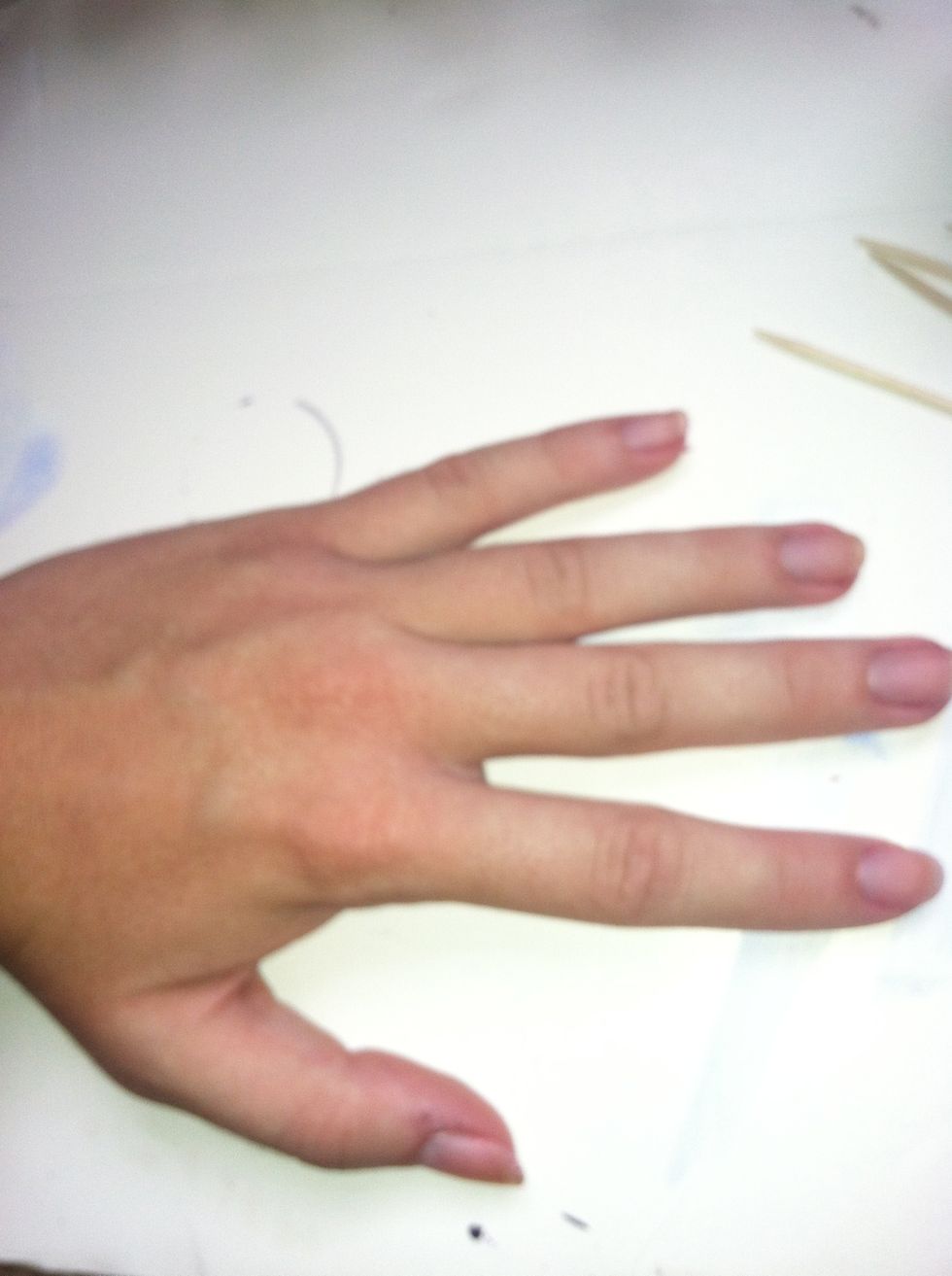 Start with clean, polish-free nails