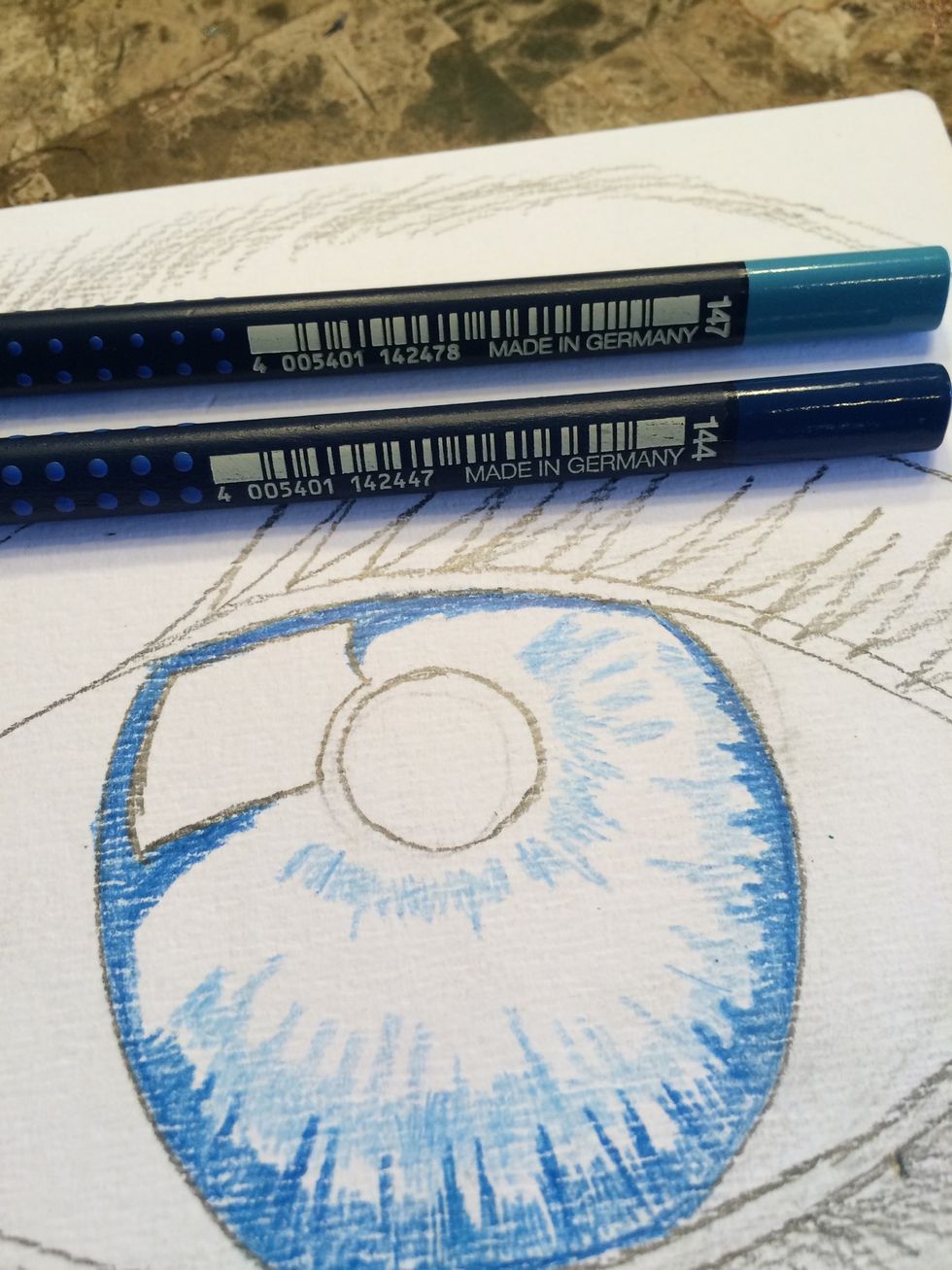 Start with Design Memory Craft (R) Art Grip (R) Aquarelle Watercolor Pencils #144 & #147, using the darker around the edges and the light as shown.